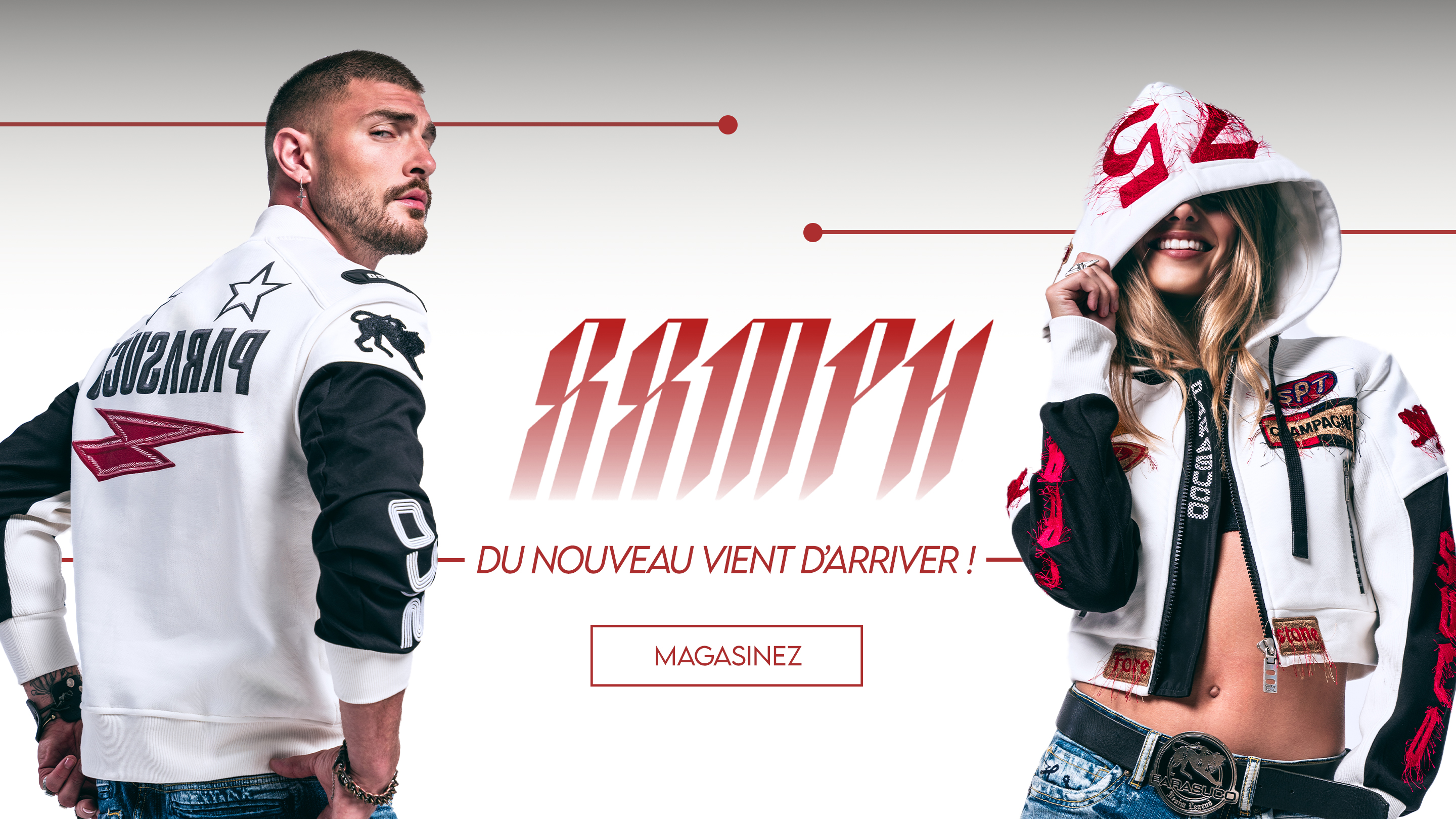 A man with tattoos on his arms, wearing a black graphic tank top, denim jorts, and black leather boots, stands holding a red and black helmet. Beside him, an identical-looking man with arm tattoos sits on the back of a black pickup truck with large tires and a red toolbox. The truck's bed is loaded with spare tires and gear. The background is a dirt road with trees and a wooden fence. The text 'STRAIGHT INTO JORTS' is overlaid on the image with a 'SHOP NOW' button below it.